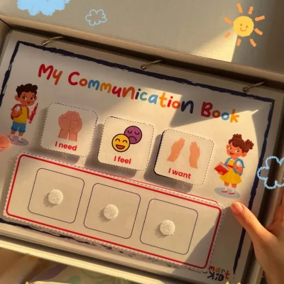 A girl using the I need, I feel and I want cards in the My English Words communication activity