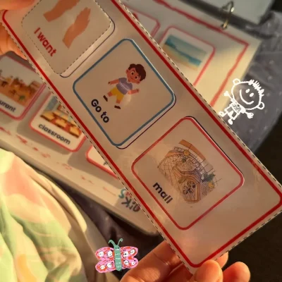 A girl building the sentence “I want to go to the mall” with My English Words cards